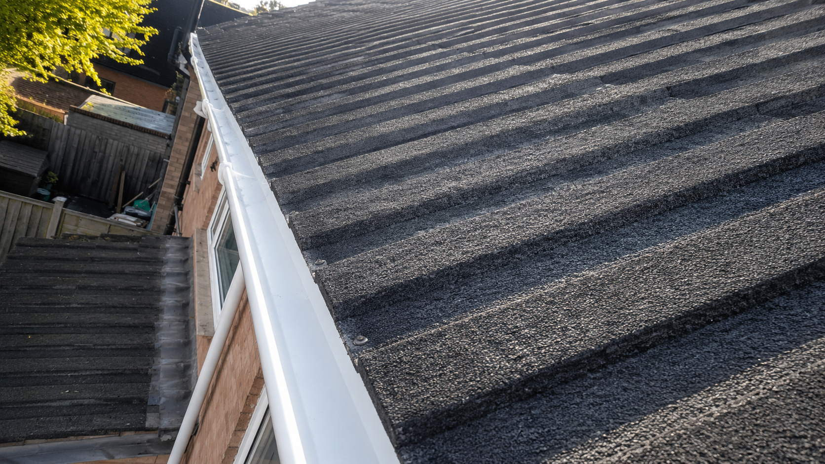 Post-clean gutter verification showing completely cleared channel